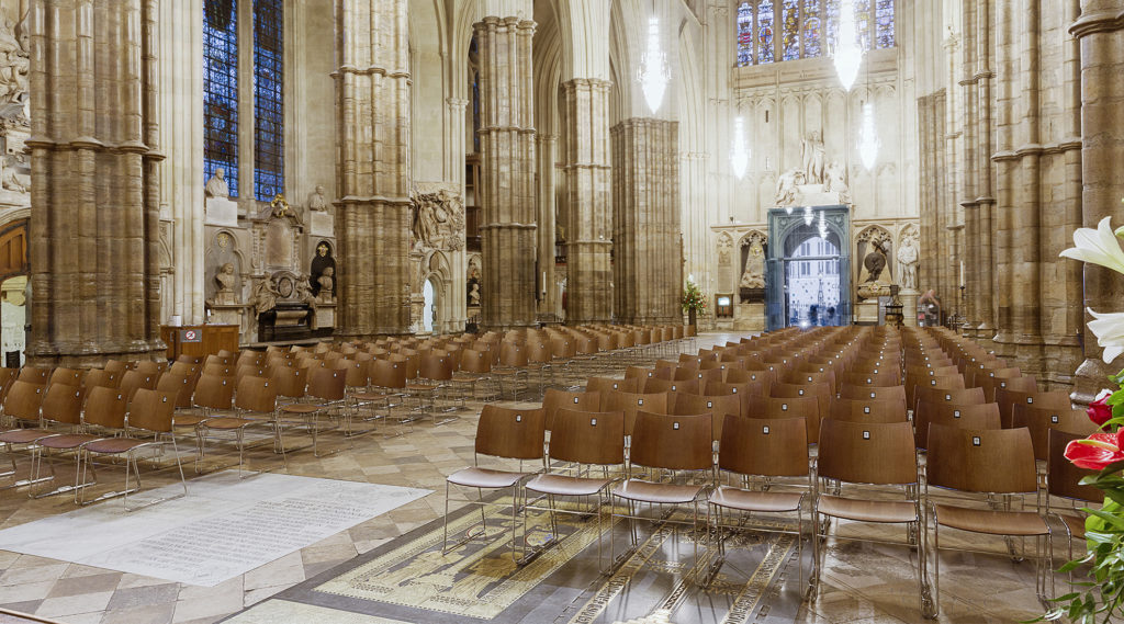 Church furniture Casala | Wooden Curvy church chairs with Zifra digital chair numbering at Westminster Abbey in London